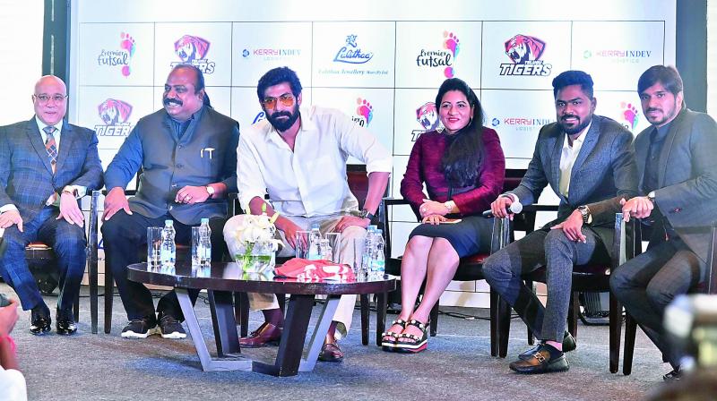 Actor Rana Daggubati (centre) at a press conference to launch Telugu Tigers as businessman Kiran Kumar (left), Premier Futsal League chairman Xavier Britto (second from left) and vice-chairman Vimala Britto look on.	 (Photo: DC)