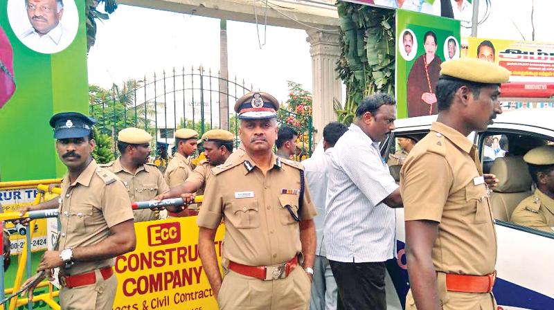 City Police Commissioner A.K. Viswanathan monitors the security operations outside the AIADMK meeting venue on Tuesday. (Photo: DC)