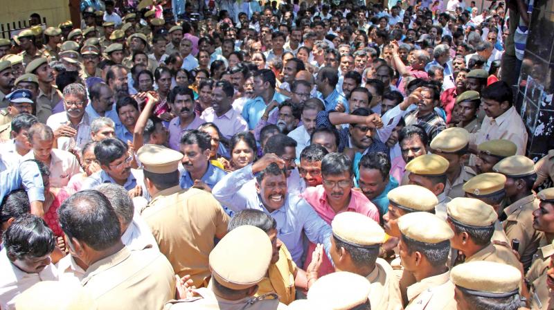 A section of government employees stage a protest in front of Chennai district collectors office on Tuesday, against New Pension Scheme. (Photo: DC)