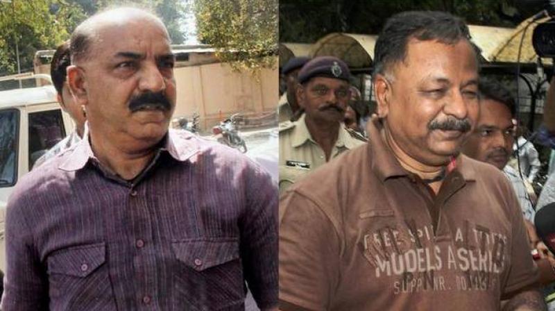 NK Amin said Tarun Barot (left) and he decided to step down from their respective posts to save the state government from embarrassment. (Photo: PTI/File)