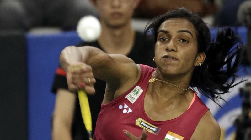 Ms PV Sindhu boarded flight 6E608 Hyd-Mumbai last carrying oversized baggage which was not fitting into overhead bin,  said the Indigo Airlines before adding,  Ms Sindhu was informed that it will be moved to cargo hold of aircraft. This is the same policy we follow for all customers.  (Photo: AP)