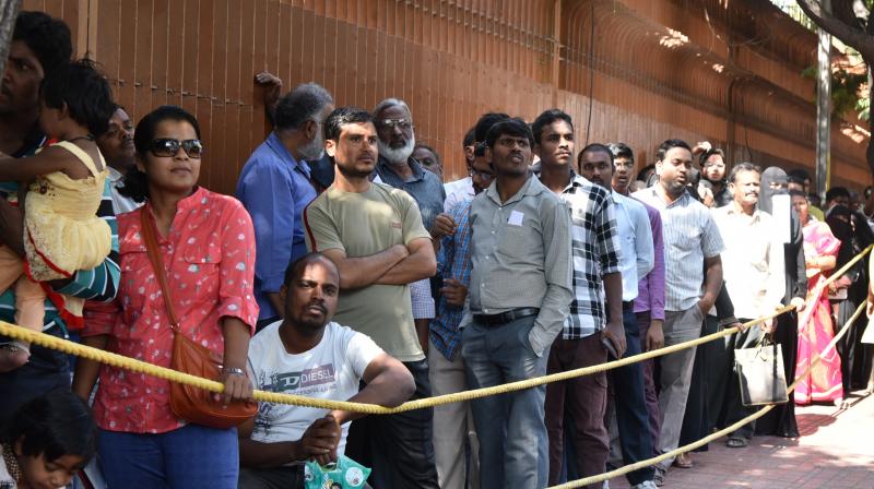 Customers stand in a queue at RBIs Hyderabad office to exchange their banned currency notes on Monday.  (Photo: DC)