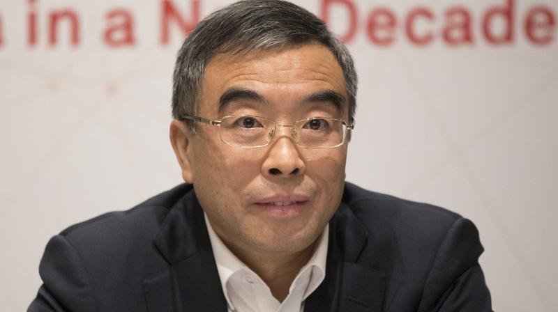 Liang spoke to reporters after the Chinese telecommunications company said it would increase Canadian research and development investment by 15 per cent this year and add 200 R&D jobs, expanding its workforce by 20 per cent. (Photo: AP)