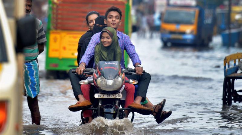 After a brief hiatus from the incessant rains, Chennai and other parts of coastal Tamil Nadu witnessed another spell of heavy downpour on Friday evening. (Photo: PTI)