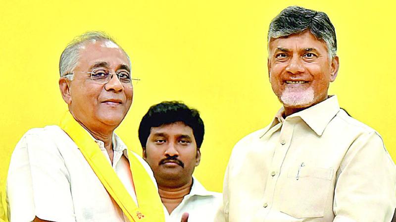 Chief Minister N. Chandrababu Naidu welcomes K.C. Deo into the Telugu Desam on Sunday.