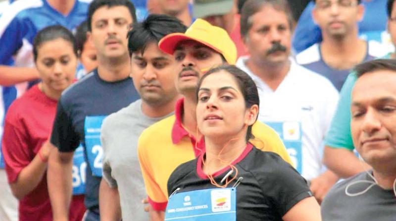 File picture of a Bengaluru woman at a marathon