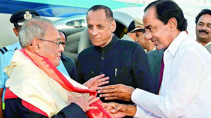 President Pranab Mukherjee being received by Governor E.S.L. Narasimhan, Chief Minister K. Chandrasekhar Rao and Union minister Bandaru Dattatreya after his arrival at the Hakimpet airport on Thursday. During his annual stay in Hyderabad, the last one of his tenure, the President will stay at Rashtrapati Nilayam, Bolaram until December 31. (Representational Image)