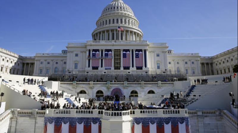 The US Capitol looms over a stage during a rehearsal of President-elect Donald Trumps swearing-in ceremony. (Photo: AP)