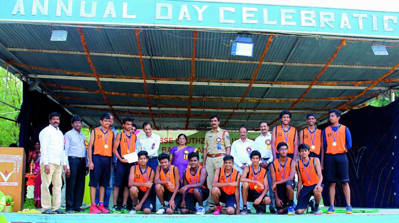 Members of the Oakridge International School (Gachibowli) team pose with their medals after winning the CBSE South Zone cluster U-19 basketball.