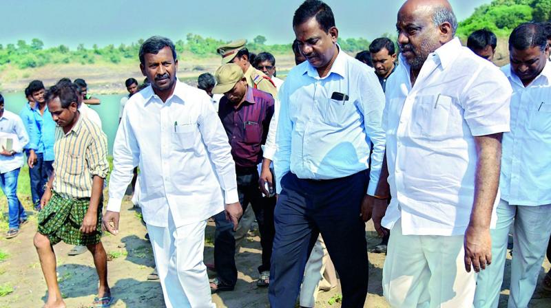 Minister for forest and environment Jogu Ramanna inspects the canal works of Korata-Chanaka lower Penuganga project on the Adilabad district borders.