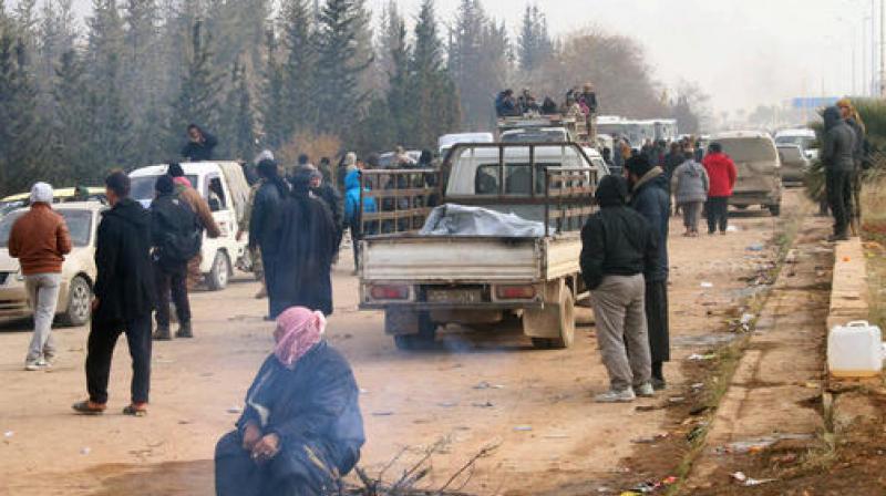 The evacuation of eastern Aleppo stalled on Friday after an eruption of gunfire, as the Syrian government and rebels threw accusations at each other, raising fears that a peaceful surrender of the opposition enclave could fall apart with thousands of people believed to be still inside. (Photo: AP)