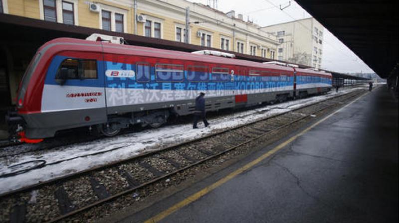 Serbian officials saw off a Russian-made train decorated with the Serb flags, churches, monasteries and medieval towns, and inscribed with Kosovo is Serbian in 20 world languages. (Photo: AP)