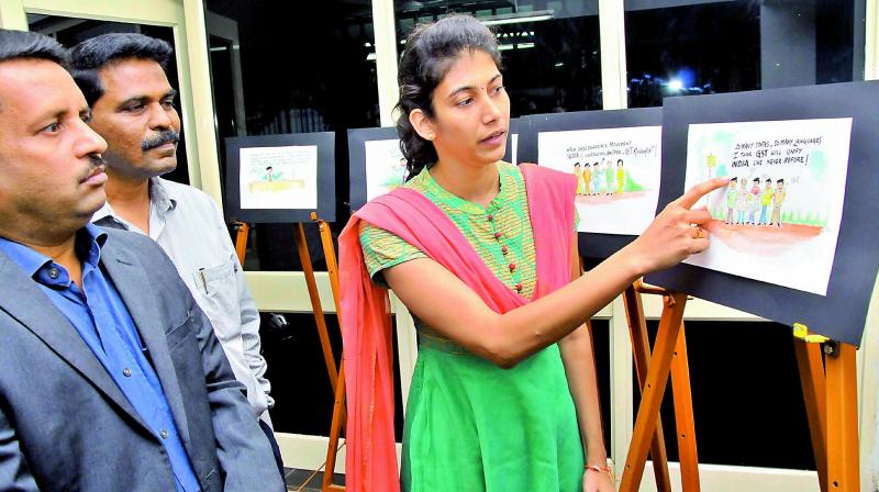 Cartoon exhibition on GST held at office of Prohibition and Central Excise on Thursday.