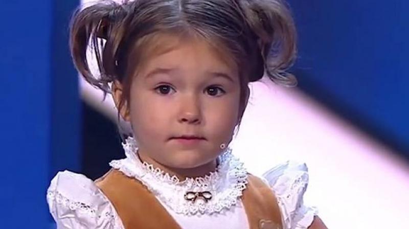 Bella, the 4-year-old Russian girl who speaks seven languages fluently. (Credit: YouTube)