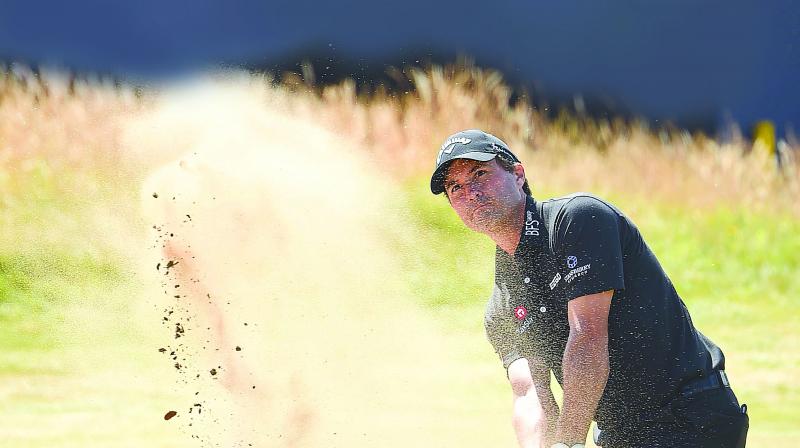 USAs Kevin Kisner in action on day one of the British Open at Carnoustie, Scotland, on Thursday.  (Photo:AFP)