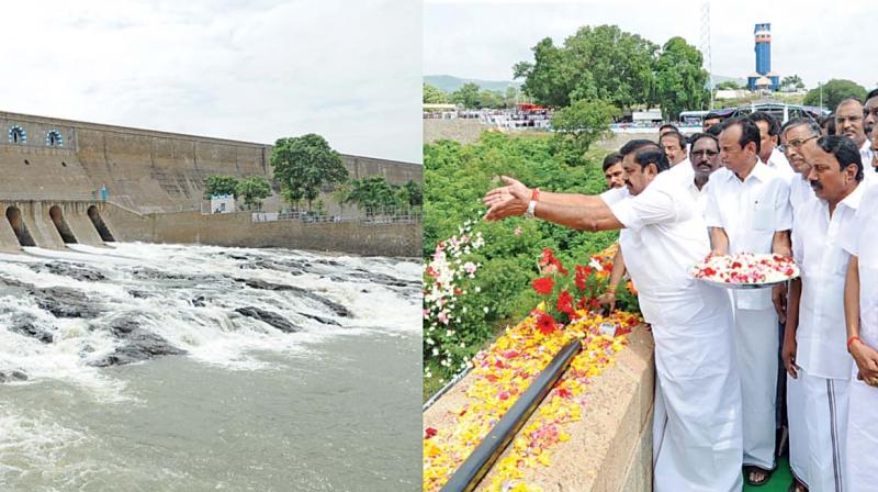 Chief Minister Edappadi K. Palaniswami offers flowers after opening the sluice gates of the Mettur reservoir for agriculture operations on Thursday. The dam was opened for the first time after the constitution of the Cauvery Management Board, to facilitate the Delta farmers to raise the paddy crop. (Photo:DC)