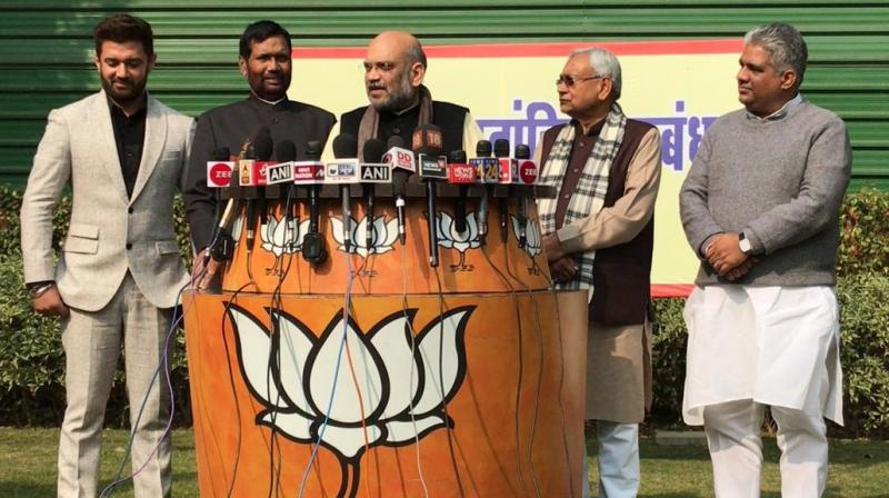 The announcement came after Amit Shahs meeting with Nitish Kumar and Ram Vilas Paswan earlier in the day. (Photo: ANI)