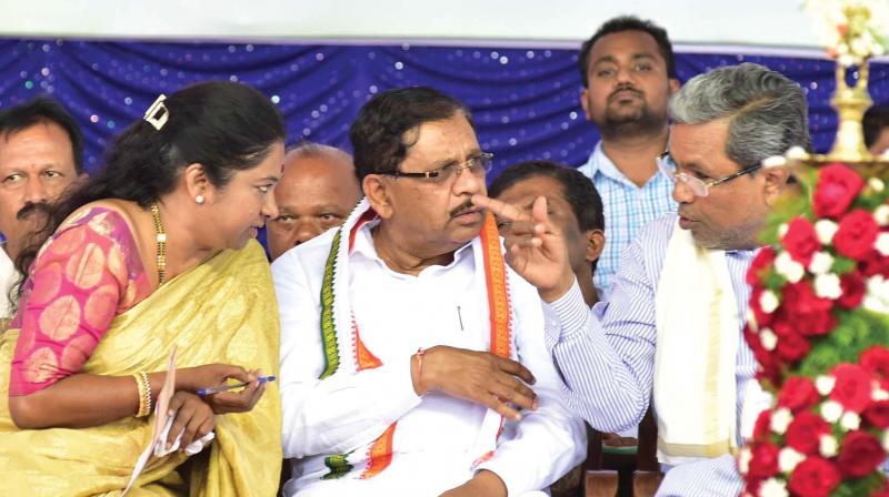 Chief Minister Siddaramaiah, home minister Dr G. Parameshwar and victorious Gundlupet Congress candidate  Geetha Mahadevprasad at  a thanksgiving meeting to express their gratitude to voters in Gundlupet on Wednesday.