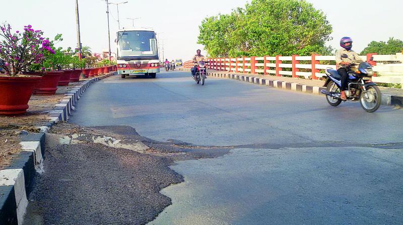 The decades-old Lalapet flyover which has many potholes. 	 File Photo