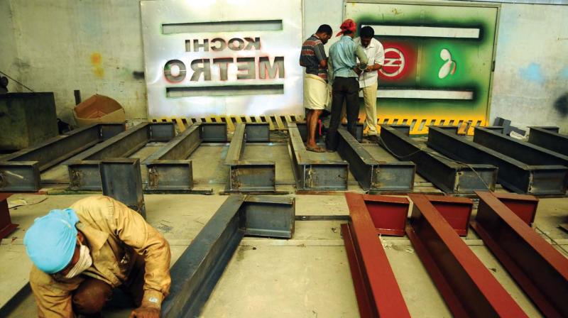 Construction of barricade boards in progress at a workshop in Pallikkara. (Photo: DC FILE)