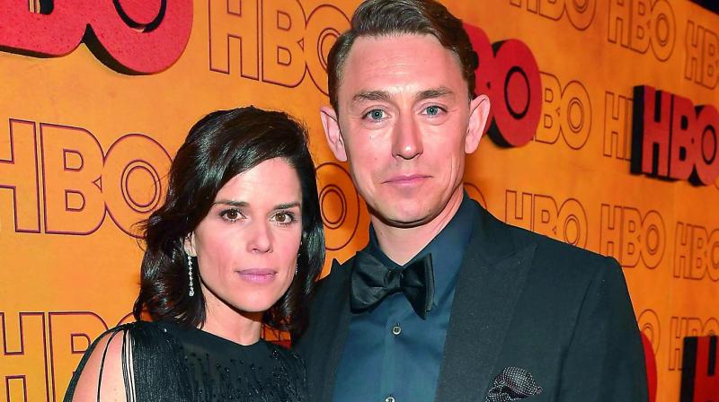 Neve Campbell and JJ Feild.