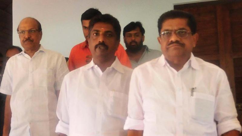 Former KPCC president V. M. Sudheeran walks out from the UDF meeting in Thiruvananthapuram. KPCC secretary Manacaud Suresh and IUML national general secretary P. K. Kunhalikutty, MP, nearby. (Photo: DC)