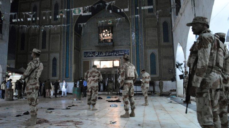The popular shrines white floor was still smeared with blood, with scattered debris including shoes, shawls, and baby bottles. (Photo: AP)