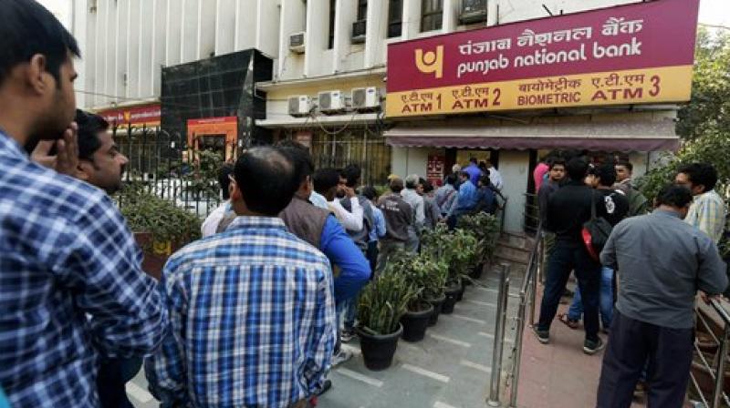 Some banks are disbursing only Rs 5,000 per person while those having better cash availability are offering Rs 10,000 or Rs 12,000 per withdrawal. (Photo: PTI)