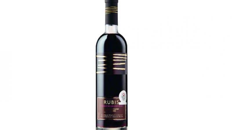 The wine is a Spanish red and has a distinct, smooth taste of dark chocolate. Made from Tempranillo grapes, it also has hints of fruity flavours like cherry and dried fig.