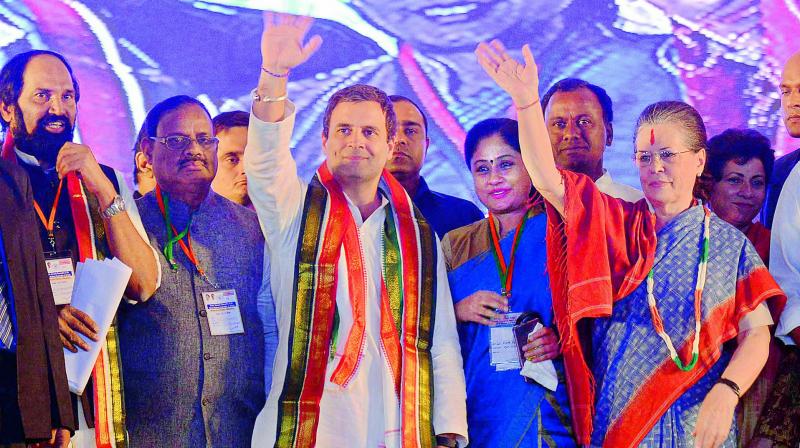 UPA chairperson Sonia Gandhi (right), Congress chief Rahul Gandhi (middle), TPCC president Uttam Kumar Reddy along with other leaders at an election rally at Medchal on Friday. 	Image: P. Surendra