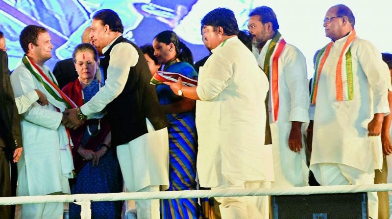 TRS leaders who joined the Congress, including Mr K. Yadava Reddy and Mr J. Jagadishwar Reddy (extreme right) greet AICC president Rahul Gandhi and UPA chairperson Sonia Gandhi at the party meeting in Medchal on Friday, Image: P Surendra