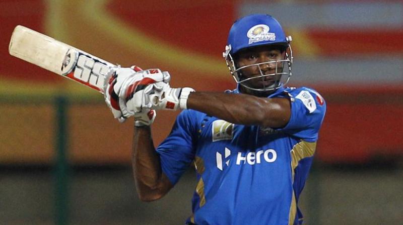 Kieron Pollard scored his first fifty of this IPL season to lead Mumbai Indians fightback after being reduced to 10/4. (Photo: AP)
