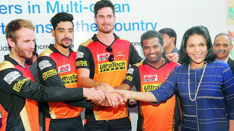 Sunrisers team members (from left) Kane Williamson, Md Siraj, Ben Cutting and Muttiah Muralitharan, join hands with Ms Sangita Reddy, joint managing director, Apollo Hospitals and pledge to donate their organs as well as encourage others to do so, at the Apollo Hospitals, Jubilee Hills on Thursday. (Photo: DC)