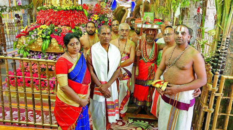 TTD EO Dr Sambasiva Rao and priests before Panchanga Sravanam on the temple premises at Tirumala on Wednesday. (Photo: DC)