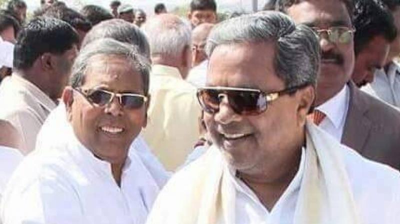 HY Meti with chief minister Siddaramaiah. (Photo: Facebook)