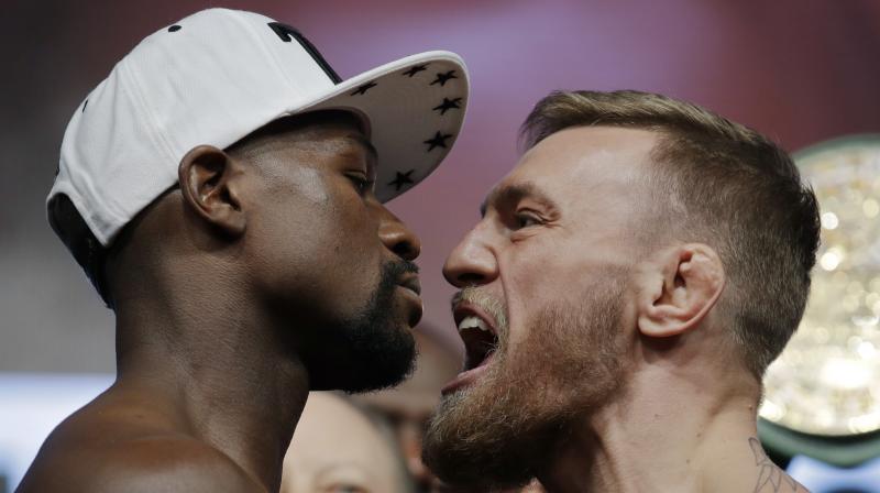 Floyd Mayweather and Conor McGregor prepared for their money-spinning showdown as Las Vegas crackled with anticipation for what is poised to become the richest fight in history. (Photo: AP)