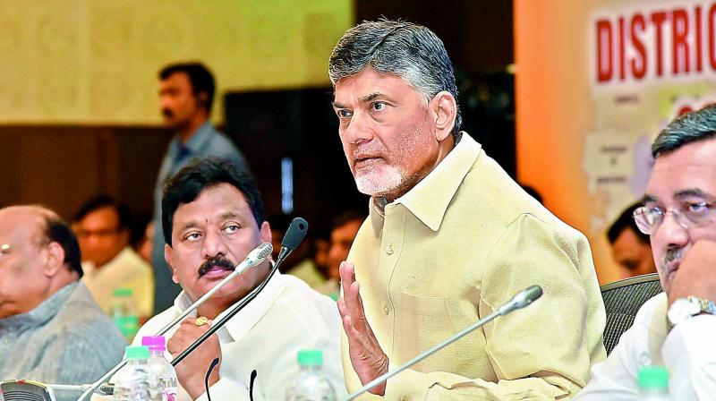 Chief Minister N. Chandrababu Naidu addresses collectors and ministers on the second day of the Collectors Conference in Vijayawada on Friday. (Photo: DC)