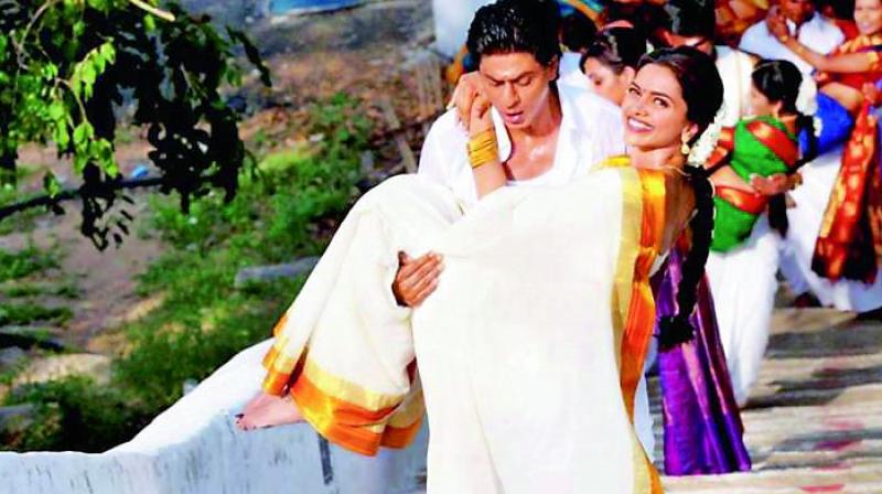 A still from the film Chennai Express, in which Shah Rukh Khans character carries Deepikas character up 300 stairs to the Vattamalai Murugan Temple in Tamil Nadu.