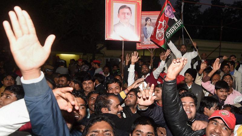 Supporters celebrate appointment of UP Chief Minister Akhilesh Yadav as national president of Samajwadi at the office in Lucknow on Sunday evening. (Photo: PTI)