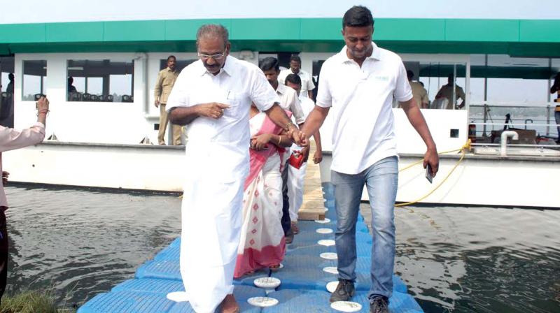 Transport Minister A.K. Sassendran comes out after the trial run of the solar ferry Aditya at Aroor.