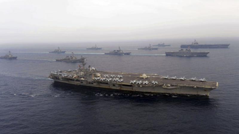 USS Ronald Reagan (bottom) and USS Carl Vinson (right top) in the Sea of Japan. (Photo: AP)