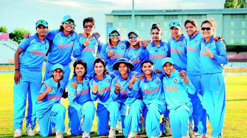 The Indian womens team strike a happy pose after their semifinal win over Australia. (Photo: AP)
