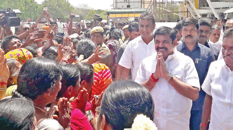 People greet CM Edappadi K. Palaniswami at Coimbatore airport on Saturday. He was on his way to Tirupur for taking part in MGR centenary celebrations (Photo: DC)