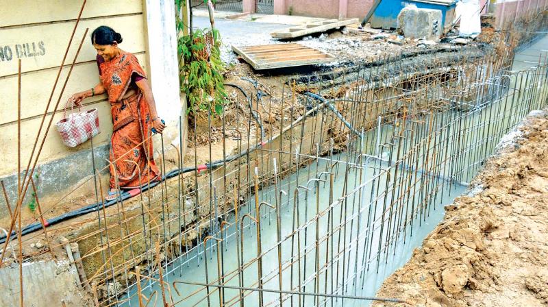 Stormwater drain work at  Ambattur progressing at a slow pace. (Photo: DC)