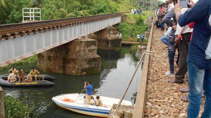 Police searching for the missing body of Shibi in Veli Lake on Saturday.