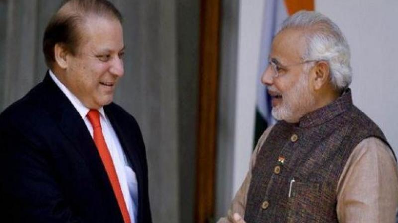 PM Narendra Modi meets Pakistan PM Nawaz Sharif. (Photo: ANI Twitter)