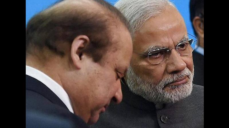 Prime Minister Narendra Modi, Pakistan Prime Minister Nawaz Sharif at Astana. (Photo: PTI)