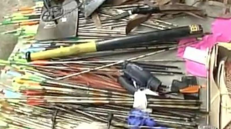 Police recover weapons during raid at Gorkha Janmukti Morcha office. (Photo: ANI | Twitter)