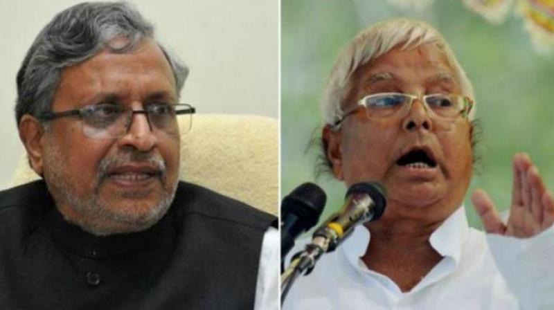 Bihar Deputy Chief Minister Sushil Kumar Modi (left) said the director of all three companies, is a right-hand man of Lalu Yadav (right) and was given sand mining contract in six districts of Bihar. (Photo: File | PTI)