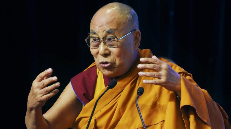 Tibetan spiritual leader, the Dalai Lama speaks during the World Peace and Harmony Conclave in Mumbai on Sunday. (Photo: PTI)